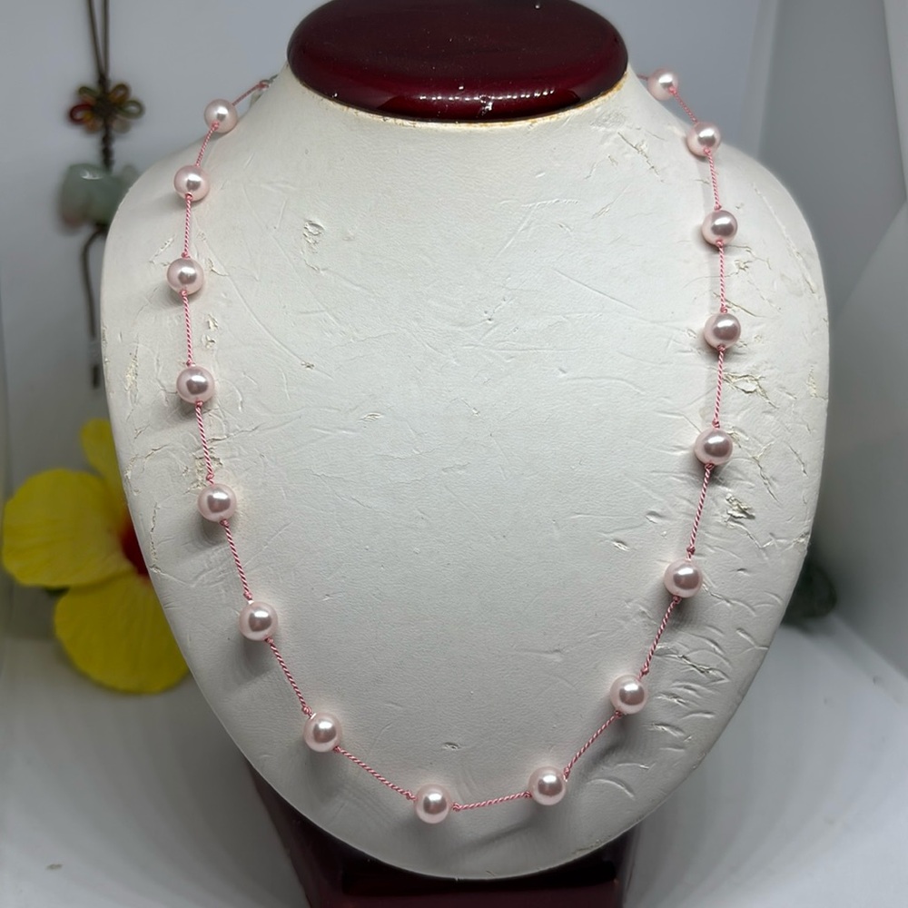 5mm Swarovski crystal pink pearl tin cup necklace. On Griffin cord silver clasp